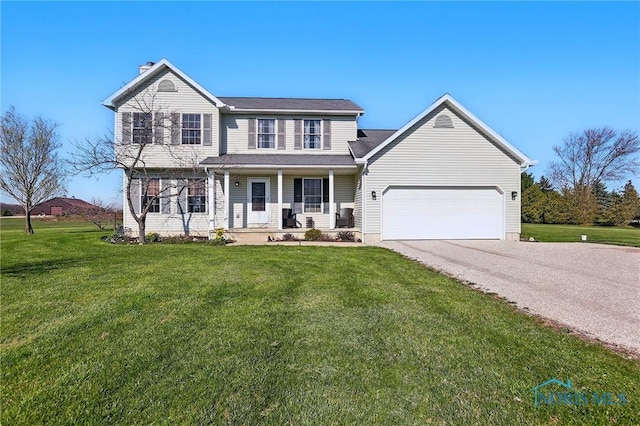 traditional-style home featuring a chimney, a front lawn, aphalt driveway, covered porch, and a garage