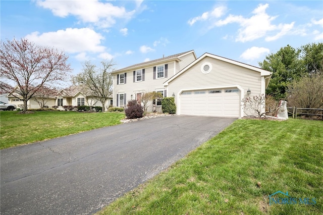 1605 Eaglecrest Rd, Perrysburg, OH 43551 - colonial inspired home with driveway, fence, an attached garage, and a front lawn