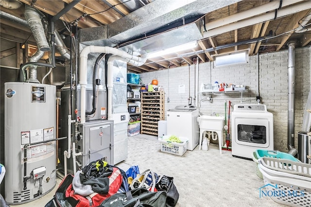 1605 Eaglecrest Rd, Perrysburg, OH 43551 - unfinished below grade area with separate washer and dryer, carpet floors, water heater, a sink, and brick wall