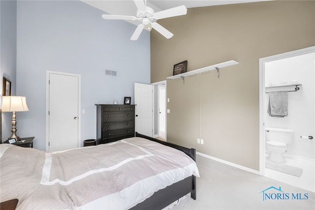 1605 Eaglecrest Rd, Perrysburg, OH 43551 - bedroom with high vaulted ceiling, carpet, ensuite bath, visible vents, and baseboards