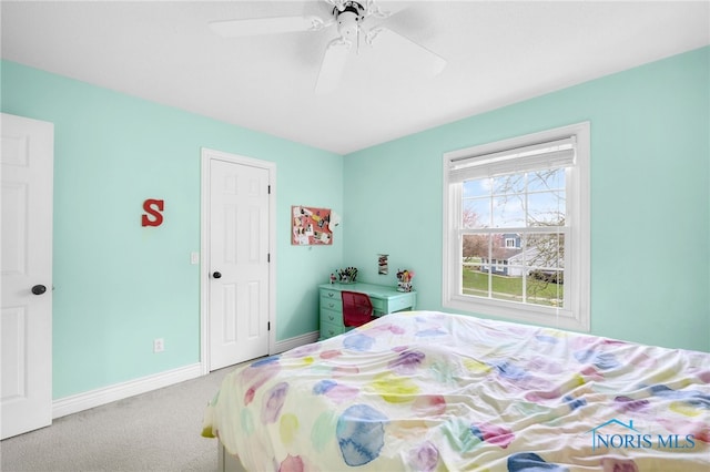 1605 Eaglecrest Rd, Perrysburg, OH 43551 - carpeted bedroom with baseboards and ceiling fan