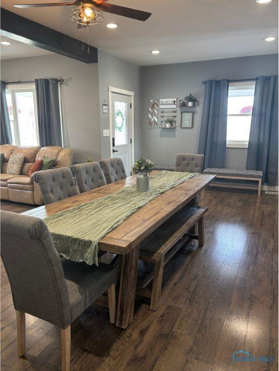 dining area with a ceiling fan, plenty of natural light, recessed lighting, and dark wood finished floors