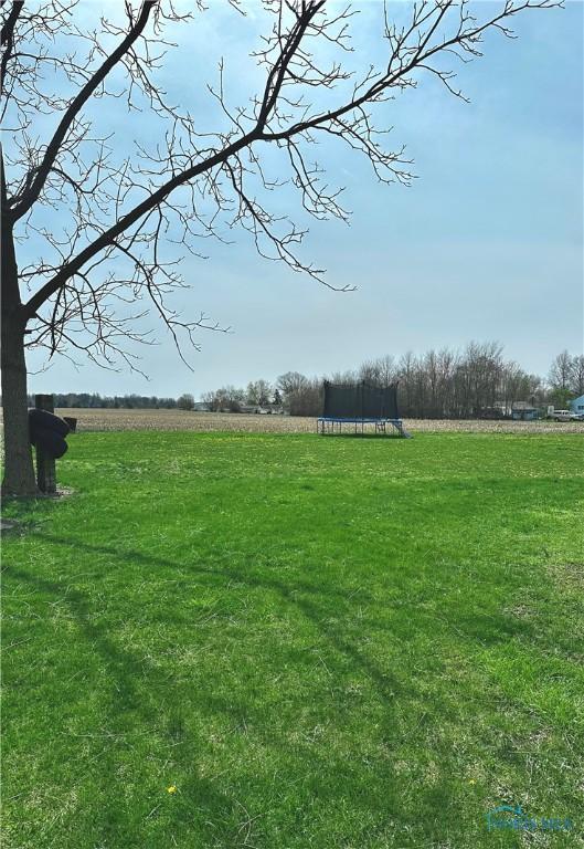 view of yard featuring a trampoline