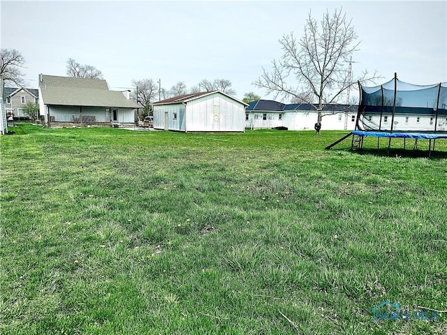 view of yard featuring a trampoline