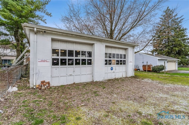 416 Cherry St, Findlay, OH 45840 - detached garage featuring fence