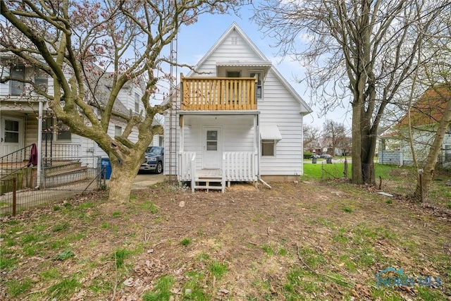 3251 Cottage Ave, Toledo, OH 43608 - back of property featuring fence and a balcony