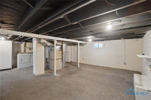basement featuring washer and dryer