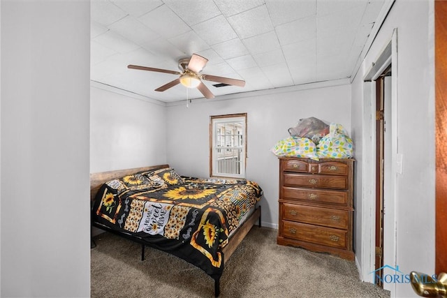 bedroom with carpet floors and a ceiling fan