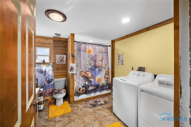 clothes washing area with recessed lighting, visible vents, washer and dryer, and laundry area