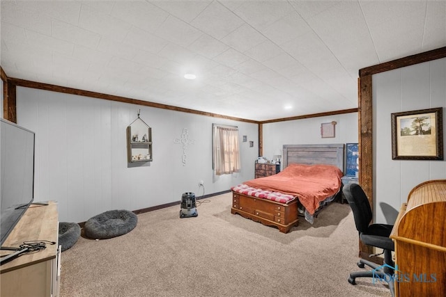 bedroom featuring carpet flooring, baseboards, and ornamental molding