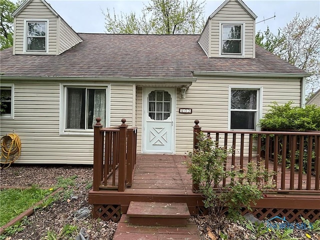 432 S Squire St, Holgate, OH 43527 - view of front of home featuring a shingled roof and a deck