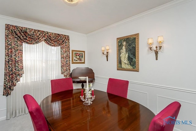 dining room with crown molding