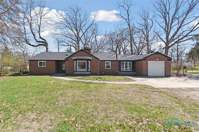 3105 W Laskey Rd, Toledo, OH 43613 - ranch-style home with a chimney, concrete driveway, an attached garage, brick siding, and a front yard