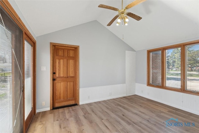 3105 W Laskey Rd, Toledo, OH 43613 - unfurnished room featuring vaulted ceiling, ceiling fan, and wood finished floors