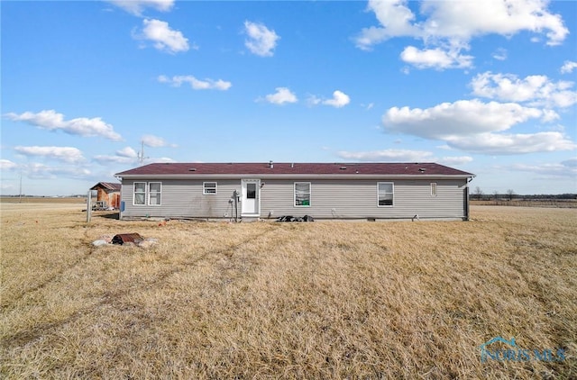 17341 Rd 139, Cecil, OH 45821 - rear view of property with a lawn
