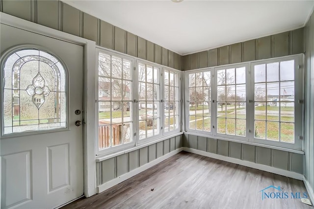 221 S Cherry St, Paulding, OH 45879 - unfurnished sunroom featuring french doors and wood finished floors