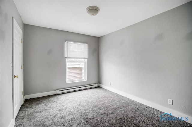 221 S Cherry St, Paulding, OH 45879 - carpeted spare room with a baseboard radiator and baseboards