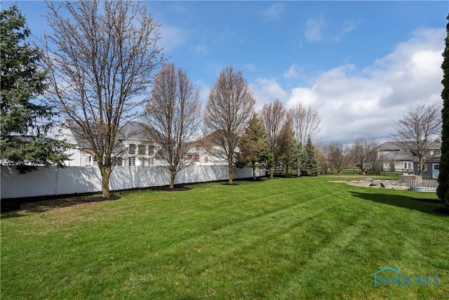 view of yard with fence