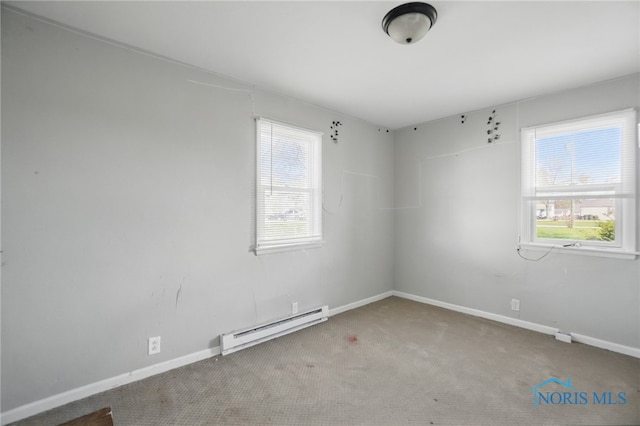 402 S 5th St, Continental, OH 45831 - unfurnished room with carpet, baseboard heating, and baseboards