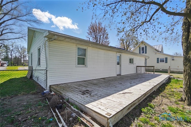 402 S 5th St, Continental, OH 45831 - rear view of house with a wooden deck and fence