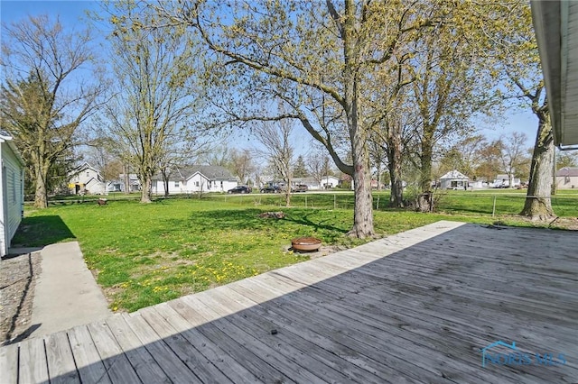 402 S 5th St, Continental, OH 45831 - deck with a residential view and a yard