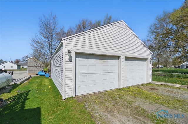 402 S 5th St, Continental, OH 45831 - detached garage featuring fence