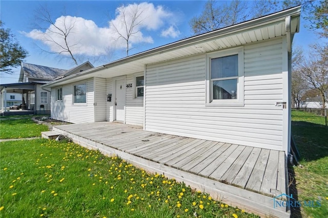402 S 5th St, Continental, OH 45831 - back of property with a yard and a wooden deck