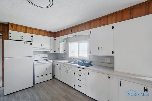 402 S 5th St, Continental, OH 45831 - kitchen with white appliances, open shelves, under cabinet range hood, light countertops, and a textured ceiling