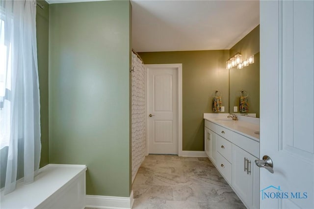 1007 Stoneleigh Rd, Perrysburg, OH 43551 - bathroom featuring baseboards and vanity