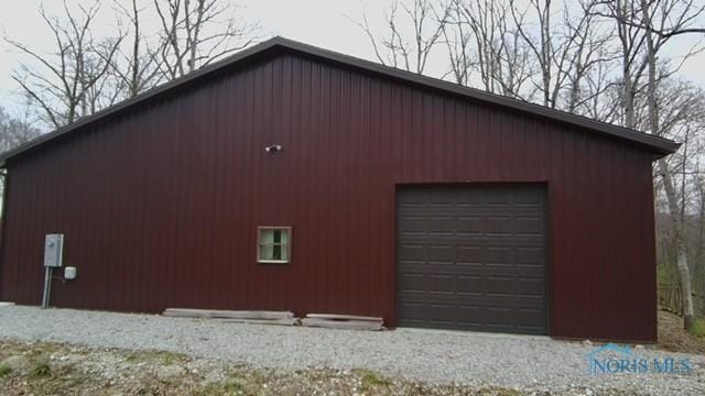 1673 Evan Dr, Defiance, OH 43512 - view of property exterior with an outbuilding and a garage