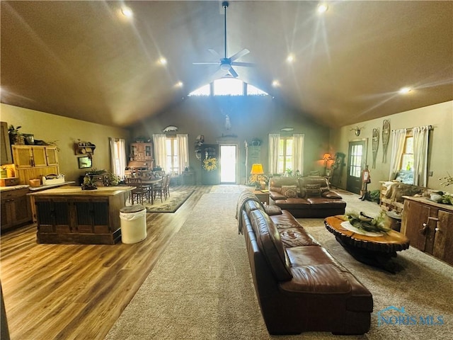 1673 Evan Dr, Defiance, OH 43512 - living area featuring a ceiling fan, wood finished floors, healthy amount of natural light, high vaulted ceiling, and recessed lighting