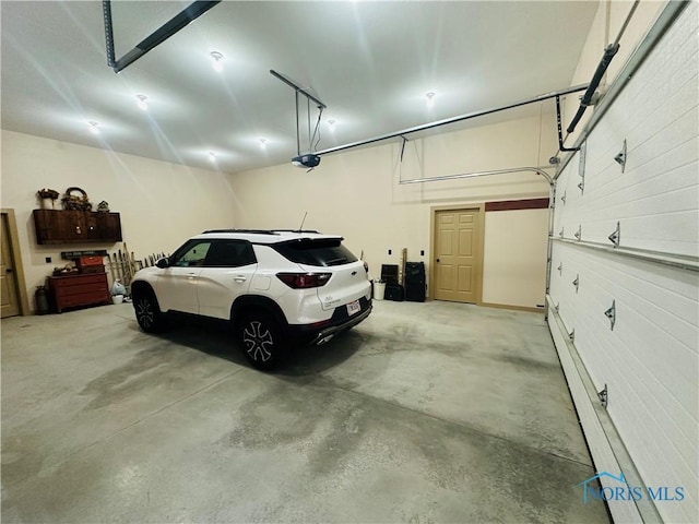 1673 Evan Dr, Defiance, OH 43512 - garage featuring a garage door opener
