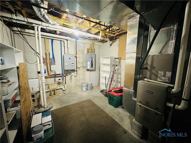 1673 Evan Dr, Defiance, OH 43512 - unfinished below grade area with water heater, electric panel, and heating unit