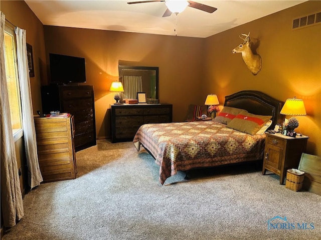 1673 Evan Dr, Defiance, OH 43512 - bedroom featuring carpet flooring and a ceiling fan