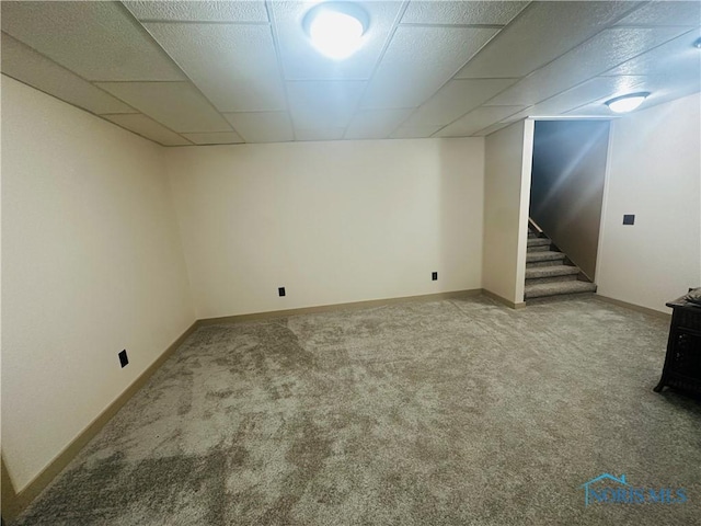 1673 Evan Dr, Defiance, OH 43512 - finished basement featuring a drop ceiling, carpet flooring, and stairway