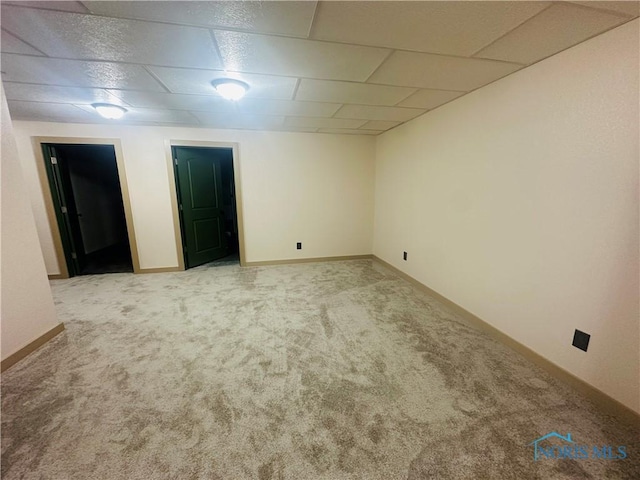 1673 Evan Dr, Defiance, OH 43512 - spare room featuring light colored carpet and a drop ceiling