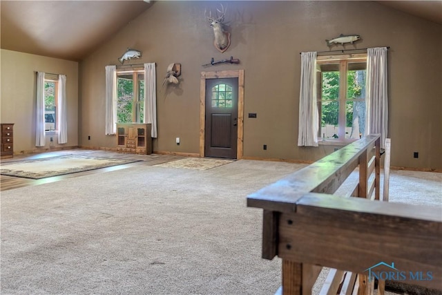 1673 Evan Dr, Defiance, OH 43512 - carpeted entrance foyer with vaulted ceiling and baseboards