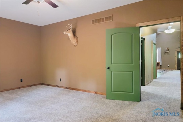 1673 Evan Dr, Defiance, OH 43512 - spare room with carpet flooring and a ceiling fan