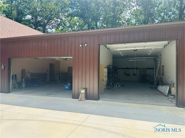 1673 Evan Dr, Defiance, OH 43512 - garage featuring driveway