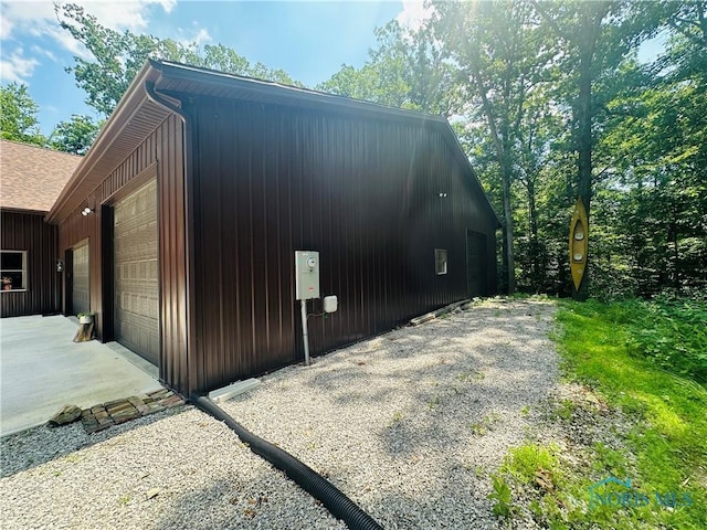 1673 Evan Dr, Defiance, OH 43512 - view of side of property with board and batten siding