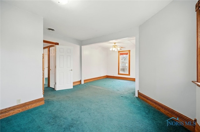 1000 Washington Ave, Findlay, OH 45840 - empty room featuring carpet flooring, baseboards, and a ceiling fan