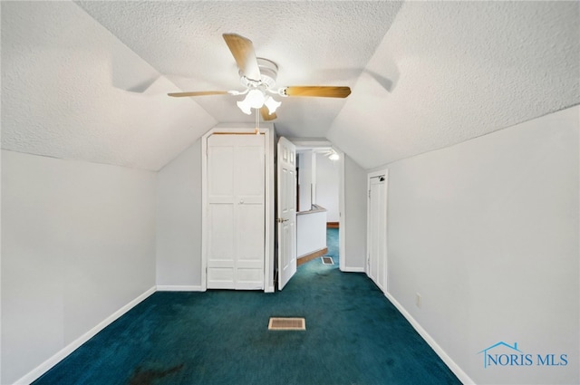 1000 Washington Ave, Findlay, OH 45840 - additional living space with a textured ceiling, ceiling fan, lofted ceiling, baseboards, and carpet floors