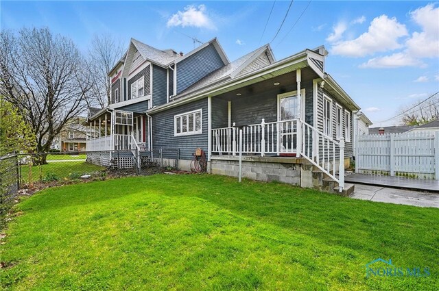 1000 Washington Ave, Findlay, OH 45840 - rear view of property with a porch