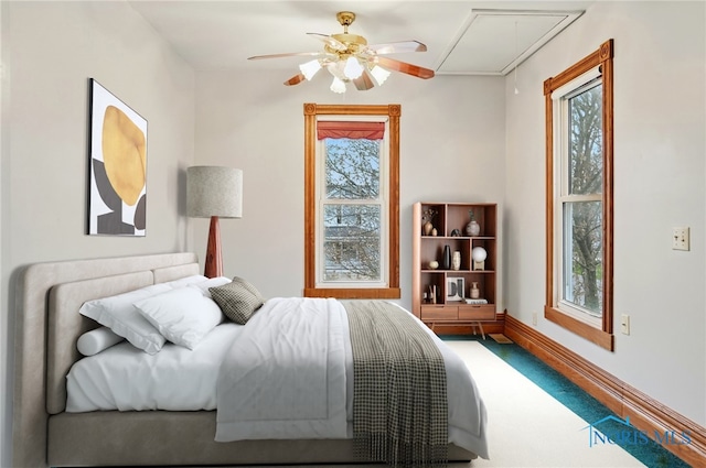 1000 Washington Ave, Findlay, OH 45840 - carpeted bedroom featuring attic access, multiple windows, and baseboards