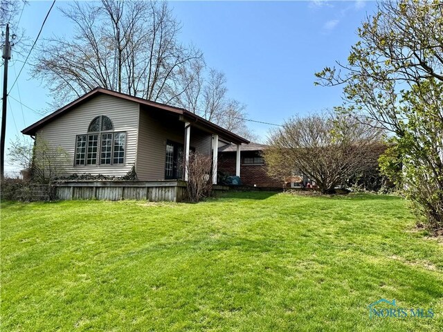 1965 Colwell Cir, Defiance, OH 43512 - exterior space with a lawn