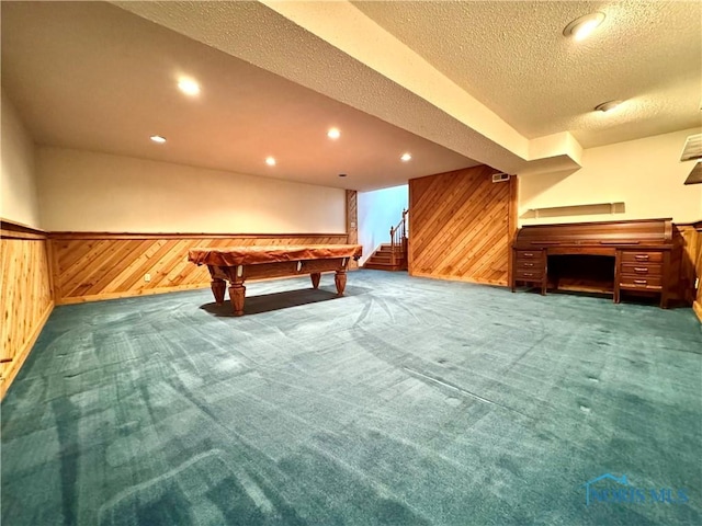 1965 Colwell Cir, Defiance, OH 43512 - playroom featuring wooden walls, carpet, a textured ceiling, and billiards