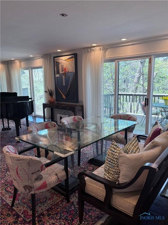 dining area featuring recessed lighting