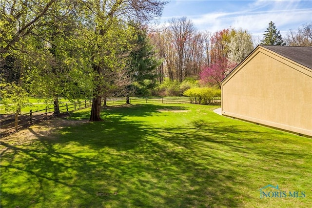 view of yard with fence