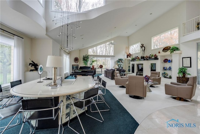 dining room with a high ceiling