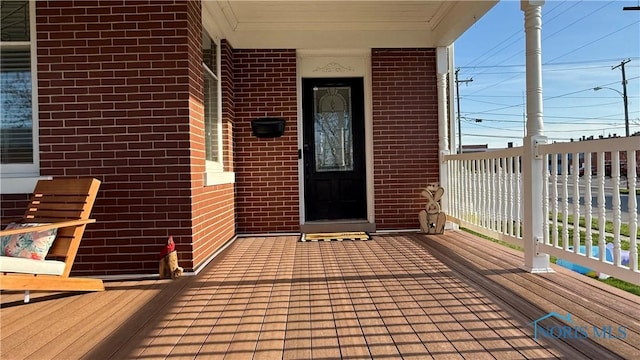 wooden deck with a porch